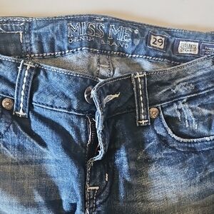 Blue Boot Cut Jeans with Natural Fading and Whiskering